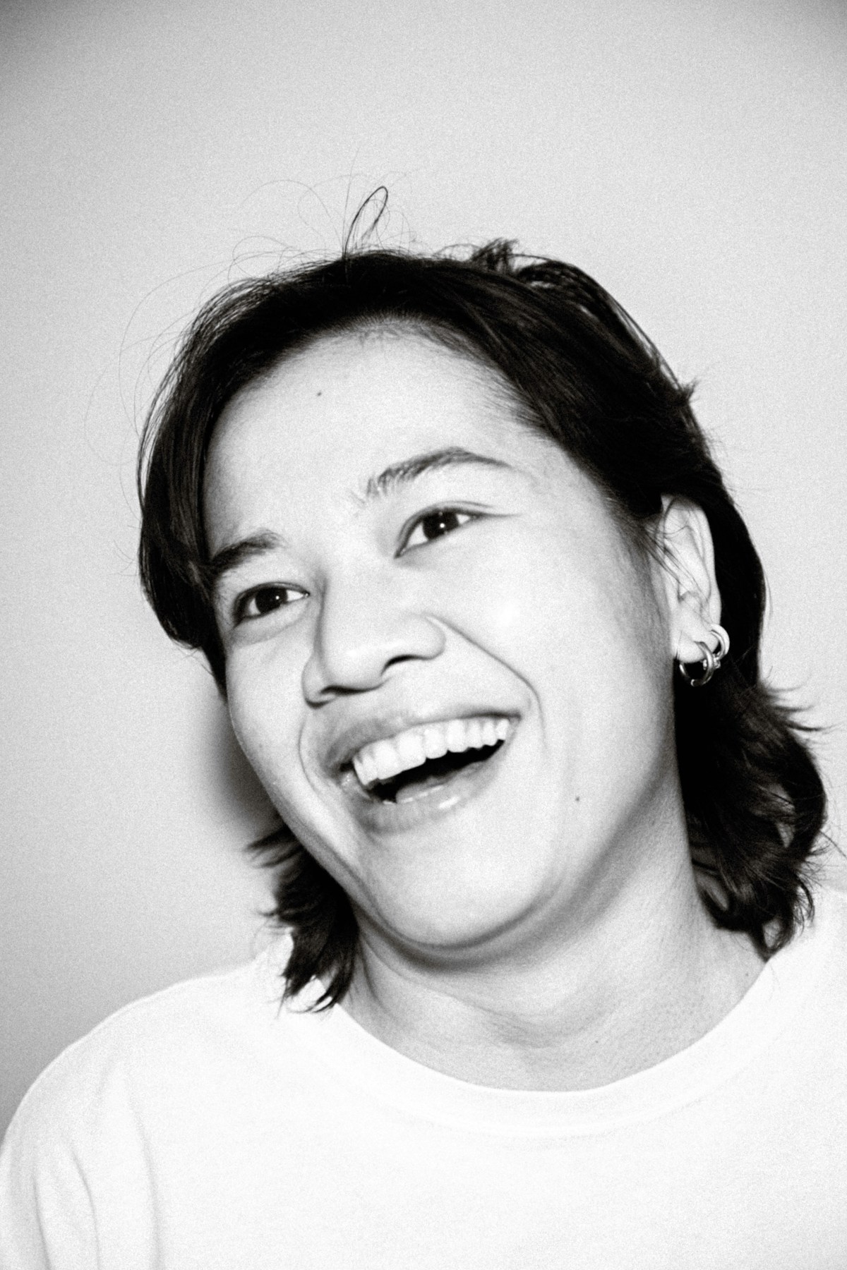 A smiling woman photographed in Bangkok